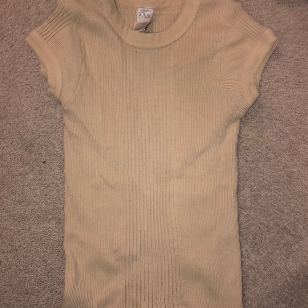 Tan shirt (fits tight)